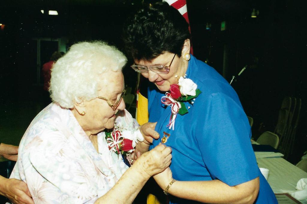 Incoming AACVFA Ladies Auxiliary President Jane F. Huffman being pinned by her mother Gertrude Harrington PP (1955-1956)