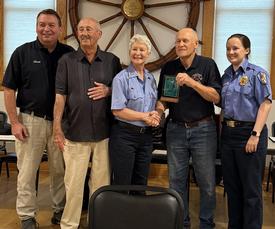 L-R, Chief Charles Tucker, Jr, Mr Chambers, Carolyn M. Chambers, Donald Evick, President Erika Nesvold